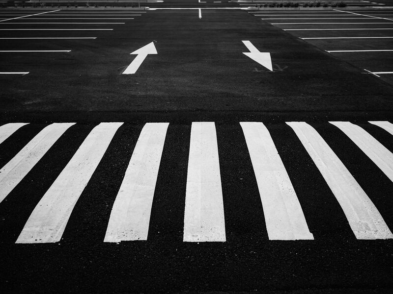 Freshly striped parking lot with crisp white line paint