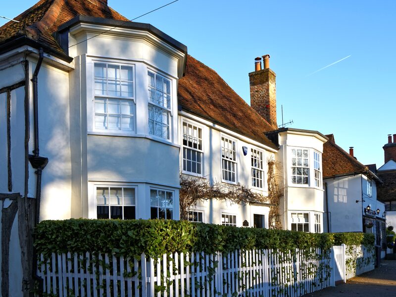 Bay window installation on a residential home exterior